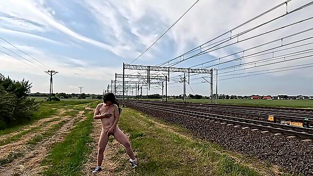 She massages her pussy all naked in public, even the train