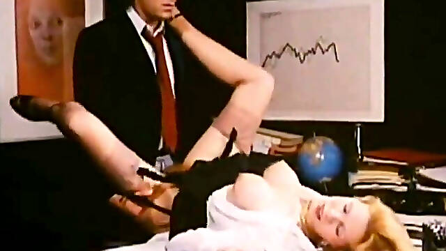 Busty vintage milf enjoys a hardcore fucking in the office