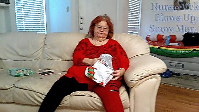 Bbw mature redheaded Nurse Vicki Blows up inflatable Snowman for you!